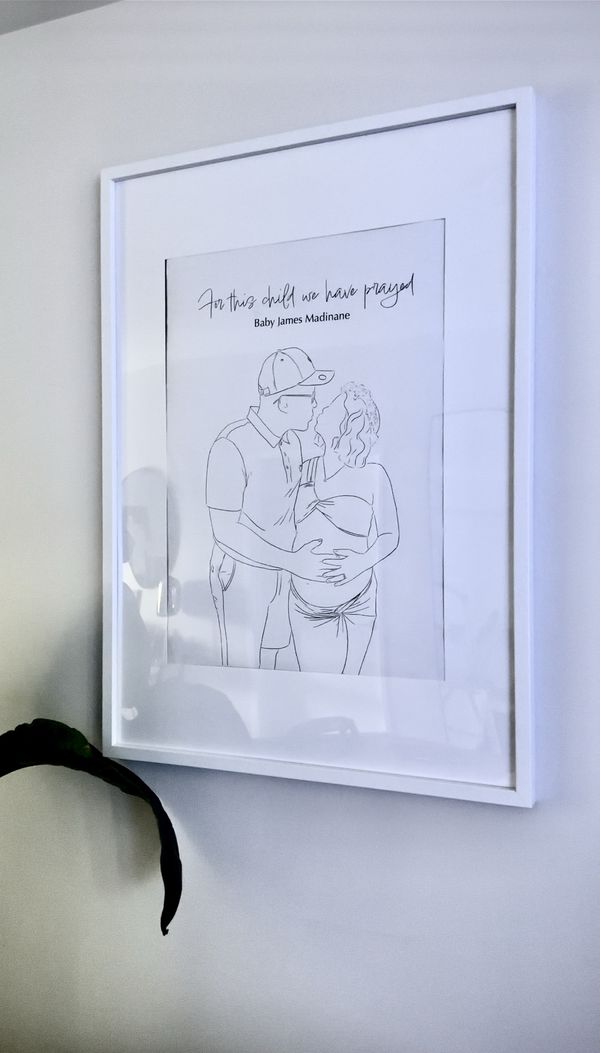 Baby James maternity line drawing framed on a wall